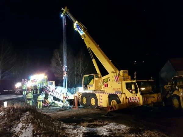 PHOTO: Troubleshooting the consequences of an accident of a vehicle carrying a digger at Komorovice